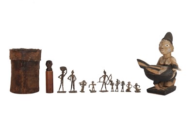 Lot 540 - A CARVED AND PAINTED TRIBAL FIGURE OF A SEATED WOMAN,  20TH CENTURY