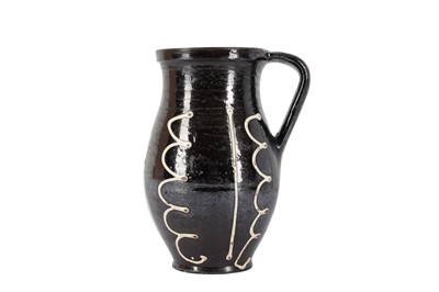 Lot 30 - A POTTERY SLIPWARE JUG, LATE 19TH/EARLY 20TH CENTURY