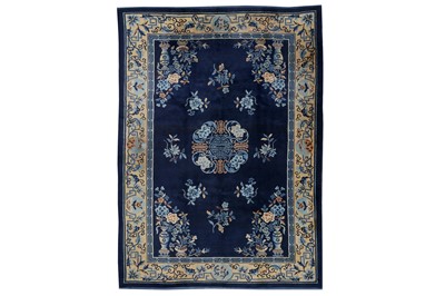 Lot 27 - A CHINESE CARPET