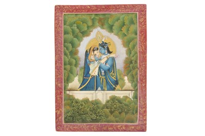 Lot 390 - KRISHNA AND RADHA IN A TENDER EMBRACE