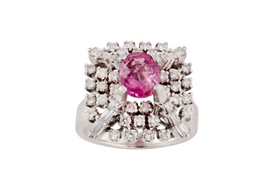 Lot 212 - A pink sapphire and diamond dress ring