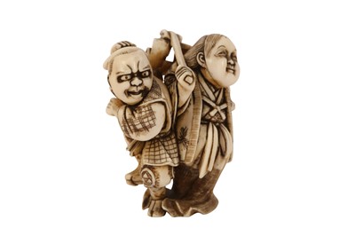 Lot 455 - λ AN IVORY NETSUKE OF KAGURA DANCERS.
