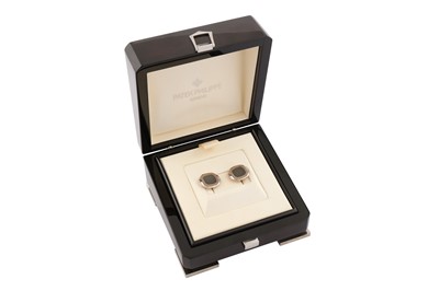 Lot 136 - Patek Philippe | A pair of white gold 'Nautilus' cufflinks