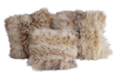 Lot 989 - A SET OF THREE GRADUATED CUSHIONS, 20TH CENTURY