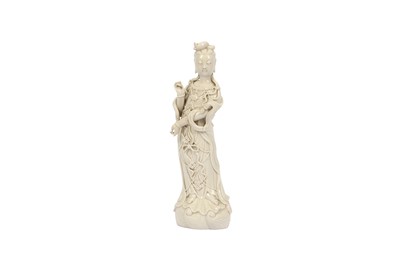 Lot 256 - A CHINESE BLANC-DE-CHINE FIGURE OF GUANYIN.