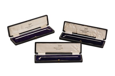 Lot 88 - An assembled set of three George V/VI novelty sterling cocktail stirrers, Sheffield 1931/35/37 by Walker and Hall