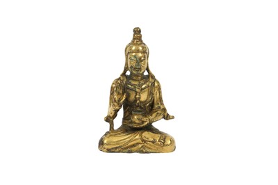 Lot 512 - A CHINESE GILT-BRONZE FIGURE OF A BUDDHA.