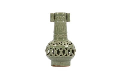 Lot 236 - A CHINESE CELADON-GLAZED DOUBLE-WALLED RETICULATED ARROW VASE.