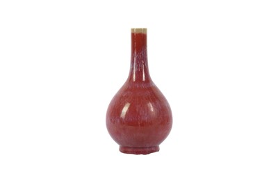 Lot 536 - A CHINESE FLAMBÉ-GLAZED BOTTLE VASE.