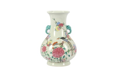 Lot 52 - A CHINESE FAMILLE ROSE CELADON-GROUND 'PARADISE FLYCATCHER' VASE.