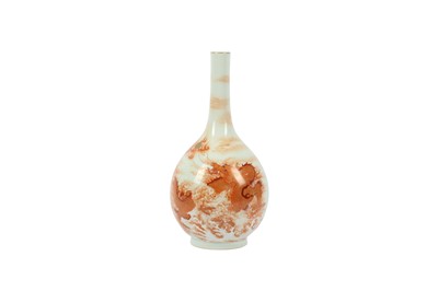 Lot 663 - A CHINESE IRON-RED AND GILT-DECORATED 'DRAGON' BOTTLE VASE.