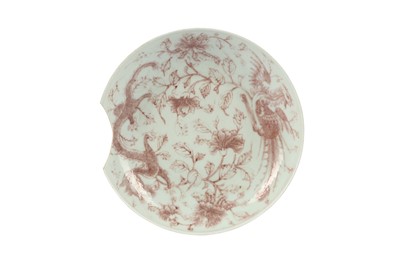 Lot 549 - A CHINESE UNDERGLAZE RED 'DRAGON AND PHOENIX' DISH.