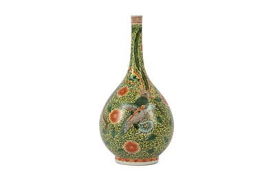 Lot 664 - A CHINESE FAMILLE VERTE 'DRAGON AND PHOENIX' BOTTLE VASE.