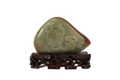 Lot 703 - A CHINESE CELADON JADE PEBBLE CARVING.