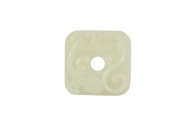 Lot 297 - A CHINESE WHITE JADE 'CHILONG' BI DISC.