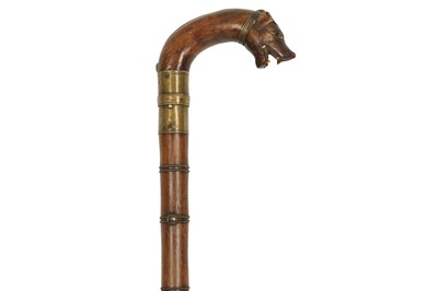 Lot 415 - A WOODEN WALKING STICK WITH A HYENA HEAD