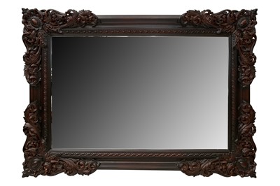 Lot 1051 - A LARGE CONTEMPORARY EXOTIC HARD WOOD MIRROR