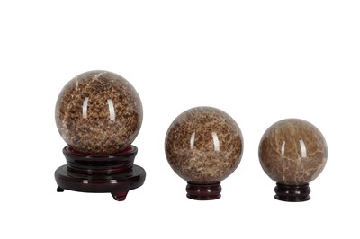 Lot 549 - A SET OF THREE FELDSPAR SPECIMEN SPHERES, CONTEMPORARY