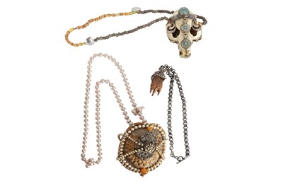 Lot 535 - A TIBETAN SKULL NECK ORNAMENT, EARLY 20TH CENTURY