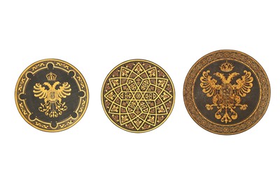 Lot 317 - THREE TOLEDO SILVER AND GOLD-DAMASCENED STEEL SAUCERS