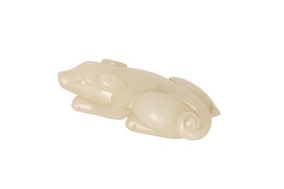 Lot 62 - A CHINESE PALE CELADON JADE 'DOG' CARVING.