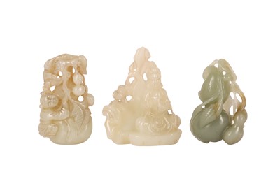 Lot 517 - THREE CHINESE PALE CELADON JADE CARVINGS.