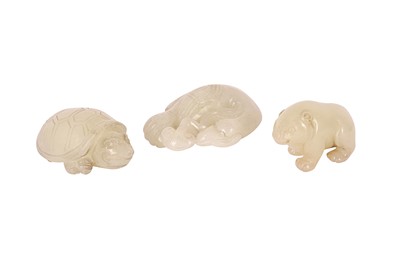 Lot 66 - THREE CHINESE WHITE JADE ANIMAL CARVINGS.