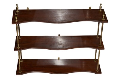 Lot 241 - A REGENCY STYLE SET OF THREE SERPENTINE MAHOGANY WALL HANGING SHELVES, 20TH CENTURY
