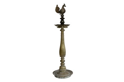 Lot 405 - AN INDIAN BRASS OIL LAMP WITH A COCKEREL MOUNT, LATE 19TH CENTURY