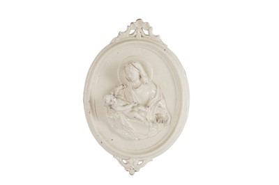 Lot 19 - A CONTINENTAL WHITE GLAZED POTTERY WALL PLAQUE, 19TH CENTURY
