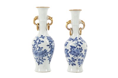 Lot 107 - A NEAR-PAIR OF CHINESE BLUE AND WHITE VASES.