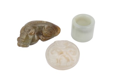 Lot 606 - THREE CHINESE PALE CELADON JADE CARVINGS.