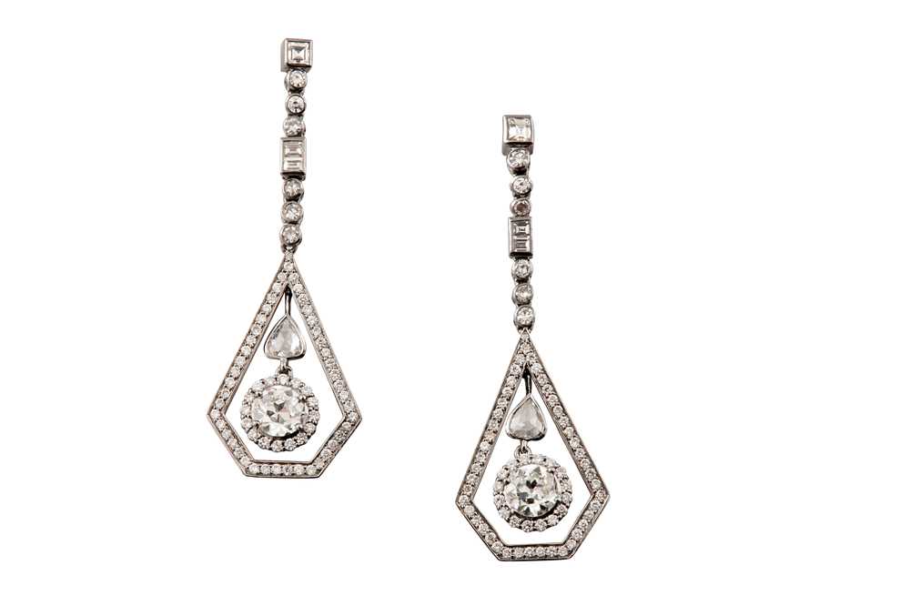 Lot 11 - A pair of diamond pendent earrings