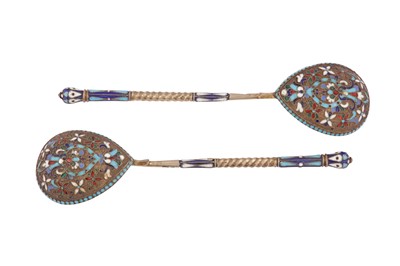 Lot 399 - A pair of Nicholas II Russian 84 zolotnik silver gilt and cloisonné enamel spoons, Moscow 1908-14 by Nikolai Nikolaievich Zverev (active 1908-14)