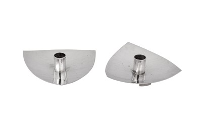 Lot 525 - A pair of Elizabeth II Scottish modernist sterling silver taper stick holders, Edinburgh 1965 by Rosa Edith Morley (reg. Dec 1948)