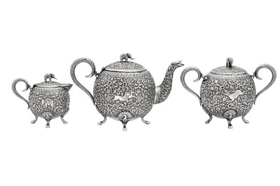Lot 174 - A late 19th century Anglo-Indian three-piece tea service, Cutch circa 1890 by V.K (unidentified, Wilkinson p.92)