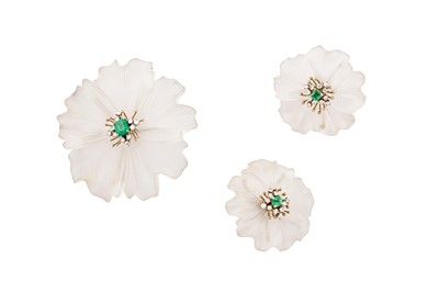 Lot 145 - An emerald, rock crystal and diamond flower brooch and earclips