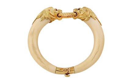 Lot 107 - λ Van Cleef & Arpels | A ruby and ivory bangle, 1974