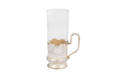 Lot 384 - A Nicolas II Russian 84 zolotnik silver gilt tea glass holder (podstakannik), Moscow 1898-1908 possibly by Pavel Vasilievich Samosonov (active 1899-1908)
