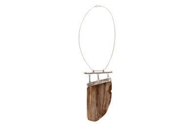 Lot 355 - A MODERN PETRIFIED WOOD PENDANT