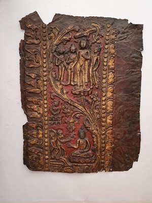 Lot 186 - A NEPALESE GILT-BRONZE PLAQUE FRAGMENT.