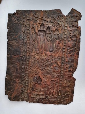 Lot 186 - A NEPALESE GILT-BRONZE PLAQUE FRAGMENT.
