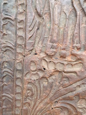 Lot 186 - A NEPALESE GILT-BRONZE PLAQUE FRAGMENT.