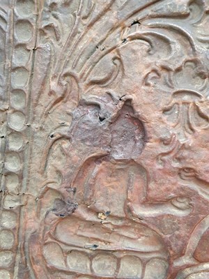 Lot 186 - A NEPALESE GILT-BRONZE PLAQUE FRAGMENT.