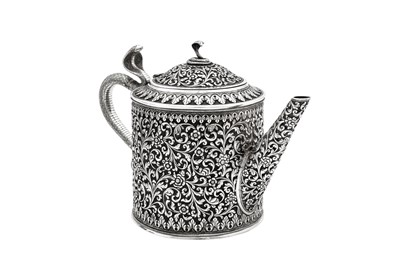 Lot 178 - A late 19th / early 20th century Anglo – Indian silver three-piece tea service, Cutch, Bhuj circa 1900 by Oomersi Mawji jnr (active 1890-1930)
