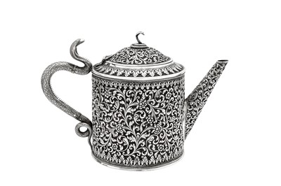 Lot 178 - A late 19th / early 20th century Anglo – Indian silver three-piece tea service, Cutch, Bhuj circa 1900 by Oomersi Mawji jnr (active 1890-1930)