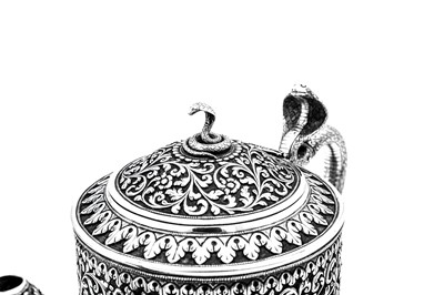 Lot 178 - A late 19th / early 20th century Anglo – Indian silver three-piece tea service, Cutch, Bhuj circa 1900 by Oomersi Mawji jnr (active 1890-1930)