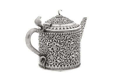 Lot 178 - A late 19th / early 20th century Anglo – Indian silver three-piece tea service, Cutch, Bhuj circa 1900 by Oomersi Mawji jnr (active 1890-1930)