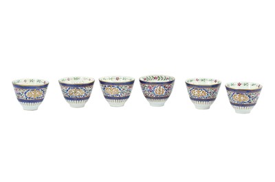 Lot 112 - SIX ENAMELLED PORCELAIN CUPS WITH GILT DETAIL