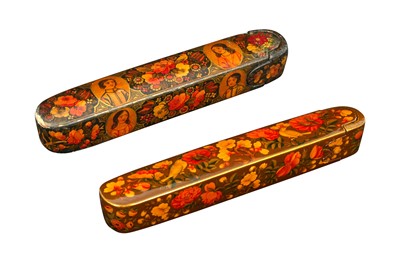 Lot 234 - TWO LACQUERED PAPIER-MÂCHÉ PEN CASES (QALAMDAN) WITH THE GOL-O-BOLBOL MOTIF